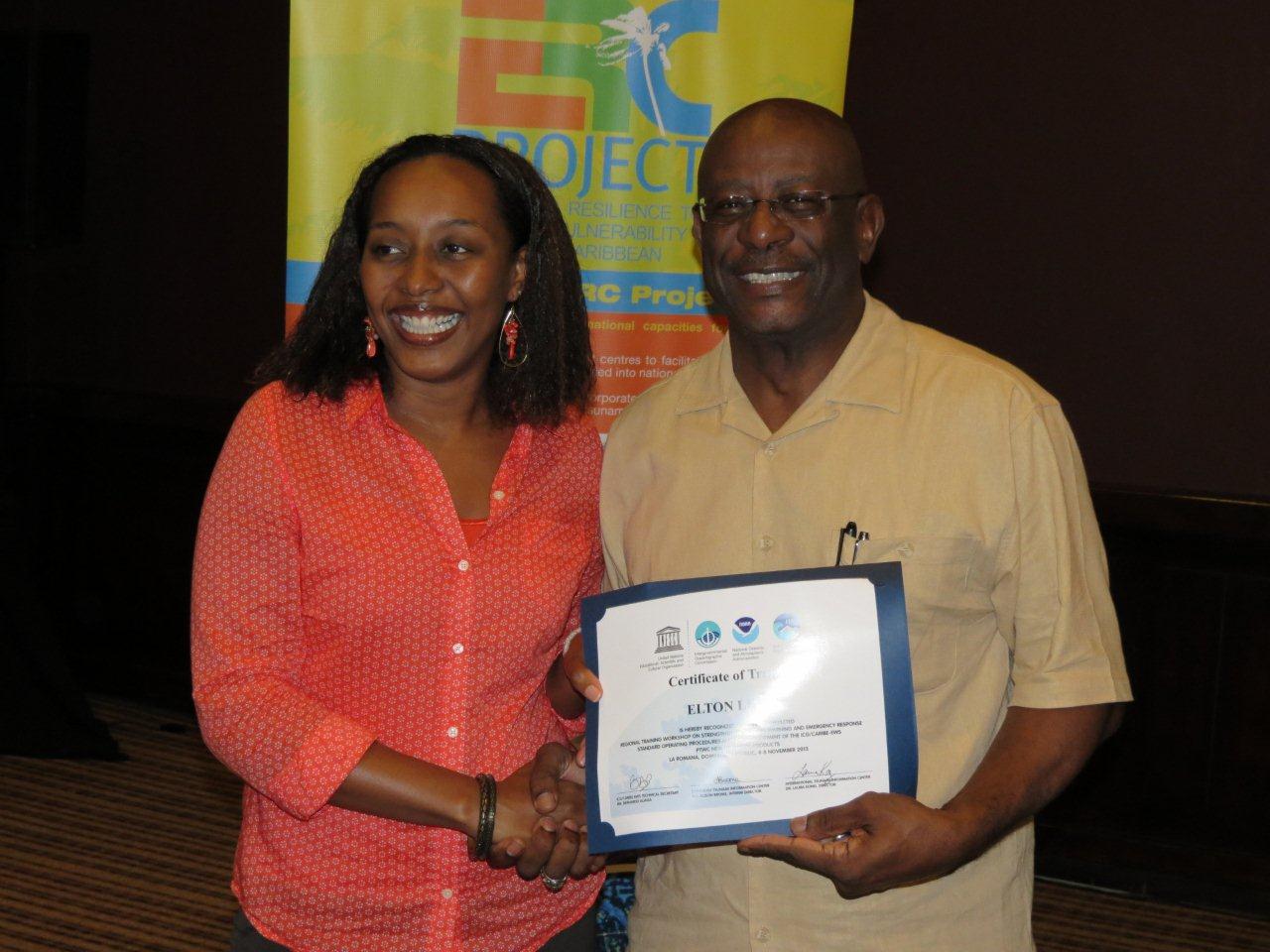 BG Elton Lewis, Director Virgin Islands Territorial Emergency Management Agency [right] receiving his certificate of completion from Ms. Alison Brome (Interim CTIC Director)