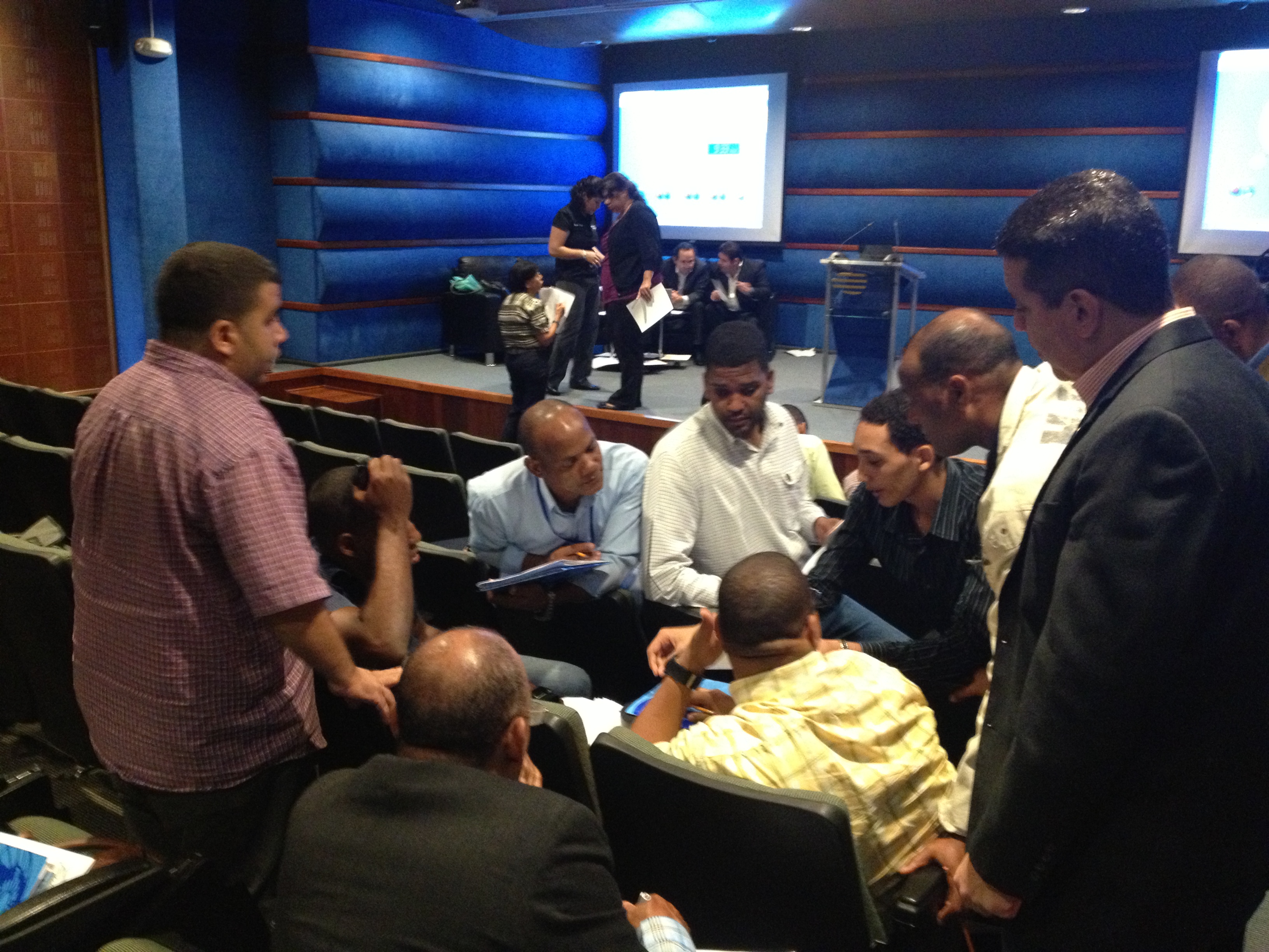 Picture taken during one of the hands on exercises with participants in the foreground and facilitators on stage (Bernardo Aliaga from UNESCO,Carolina Hincapie from PRSN and Christa von Hillebrandt-Andrade from CTWP)
